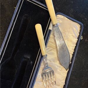 Elegant Silverware Set with Cream Handles